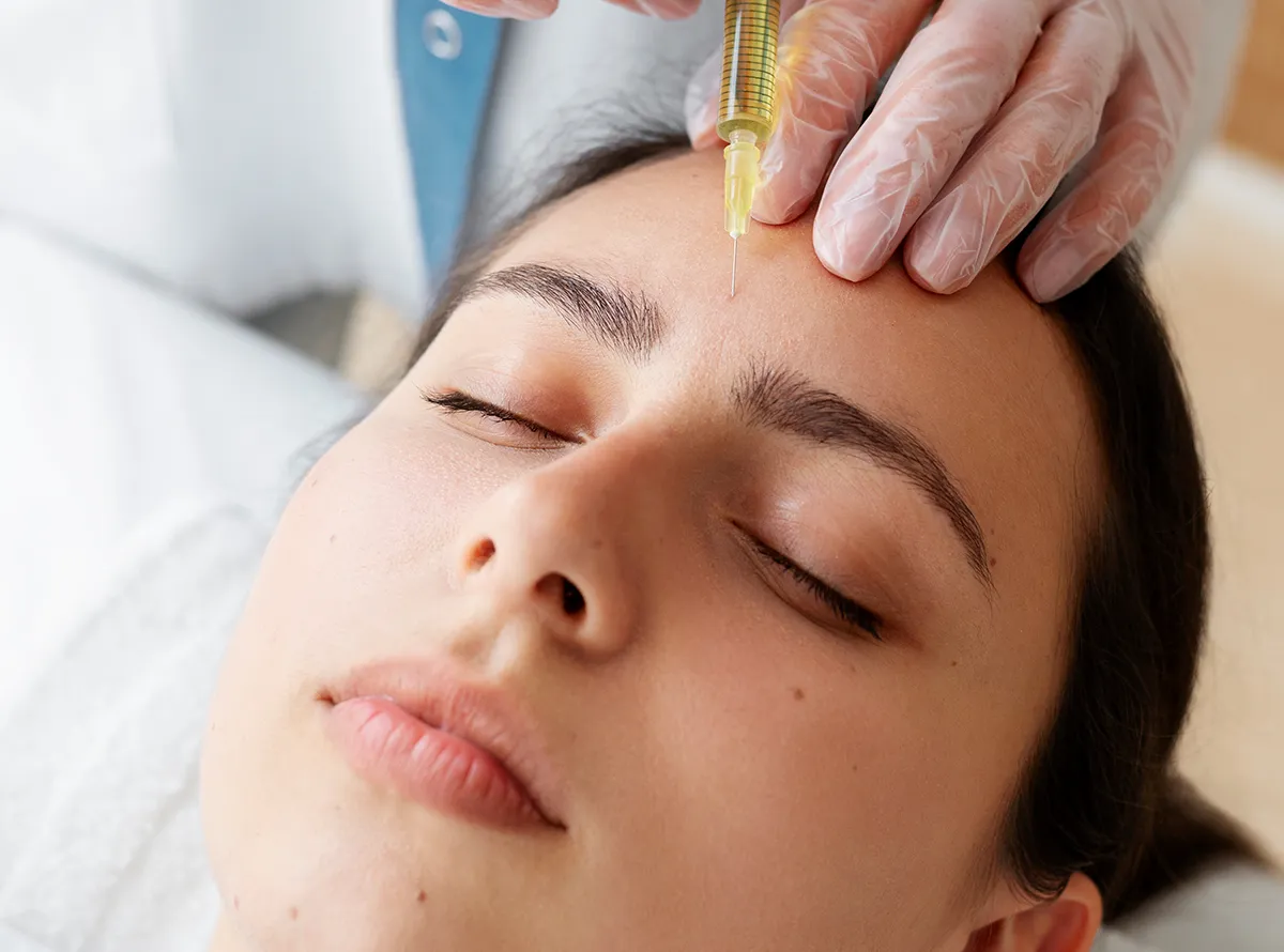 Patient receiving a facial injection treatment for fine lines and skin rejuvenation 1200x890
