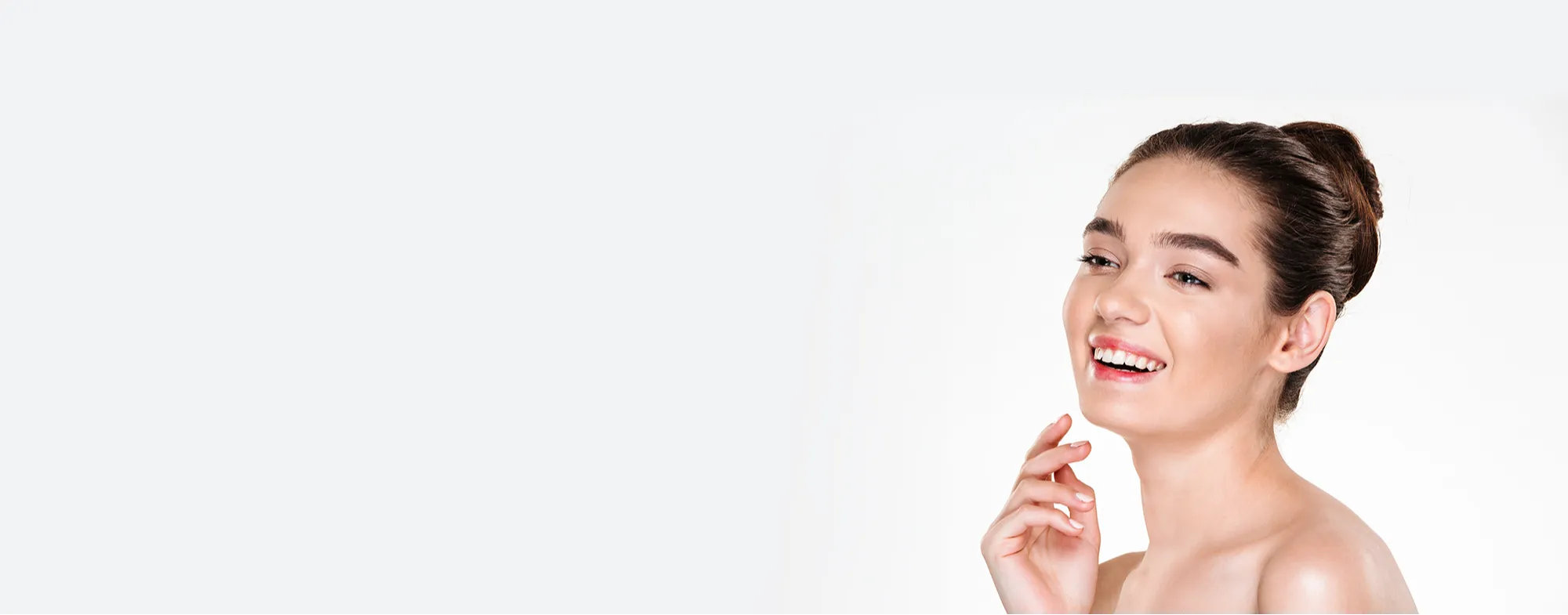 Woman with radiant skin after skin lightening treatment at Dermatrix clinic 2000x785