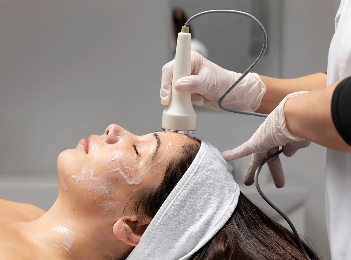 Woman receiving a professional hydrating medi facial treatment in a dermatrix clinic 1200x890